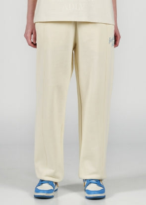 アクメドラビ(acme' de la vie) SCRIPT LOGO EMBROIDERY LONG PANTS IVORY