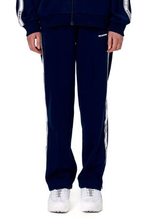 ネイキドニス(NEIKIDNIS) JACQUARD LINE TRACK PANTS / NAVY