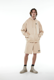 MMIC(エムエムアイシー) CURVE STITCHED ECO DYED L/SL HOODIE BG