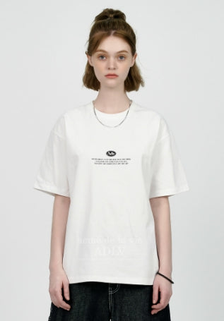 アクメドラビ(acme' de la vie) BACK SPREAD SLOGAN SHORT SLEEVE T-SHIRT PINK