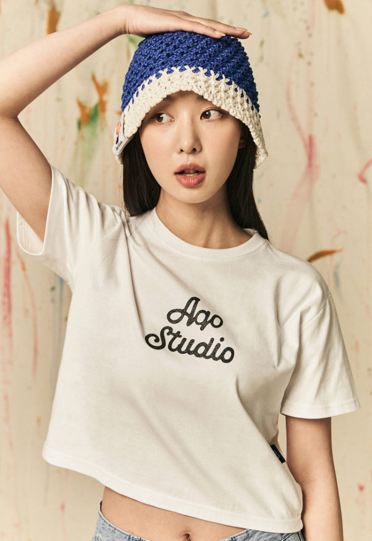 AQO_studiospace(アコスタジオスペース)  AQO A-LOGO GLITER CROP TEE WHITE