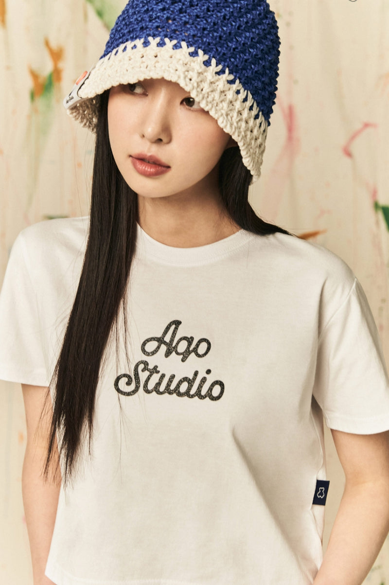 AQO_studiospace(アコスタジオスペース)  AQO A-LOGO GLITER CROP TEE WHITE