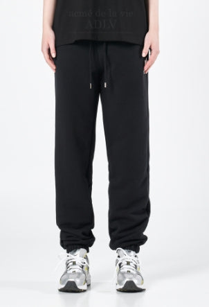 アクメドラビ(acme' de la vie) A LOGO EMBLEM PATCH TRAINING PANTS BLACK