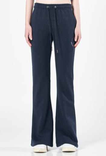 アクメドラビ(acme' de la vie) CIRCLE LOGO ARTWORK BOOTS CUT TRAINING PANTS NAVY