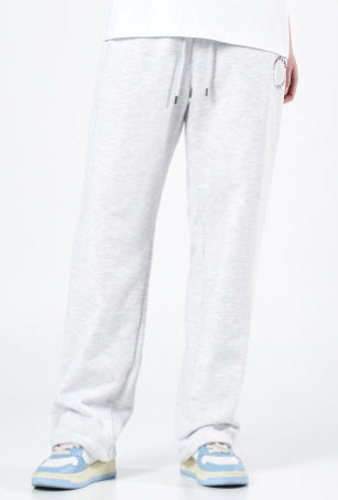 アクメドラビ(acme' de la vie)  CIRCLE LOGO ARTWORK WIDE TRAINING PANTS MELANGE