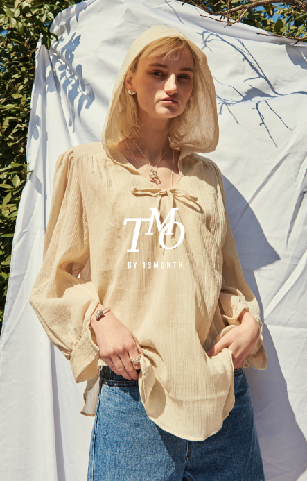 TMO BY 13MONTH（ティーエムオーバイサーティンマンス）STRING HOOD BLOUSE (BEIGE)