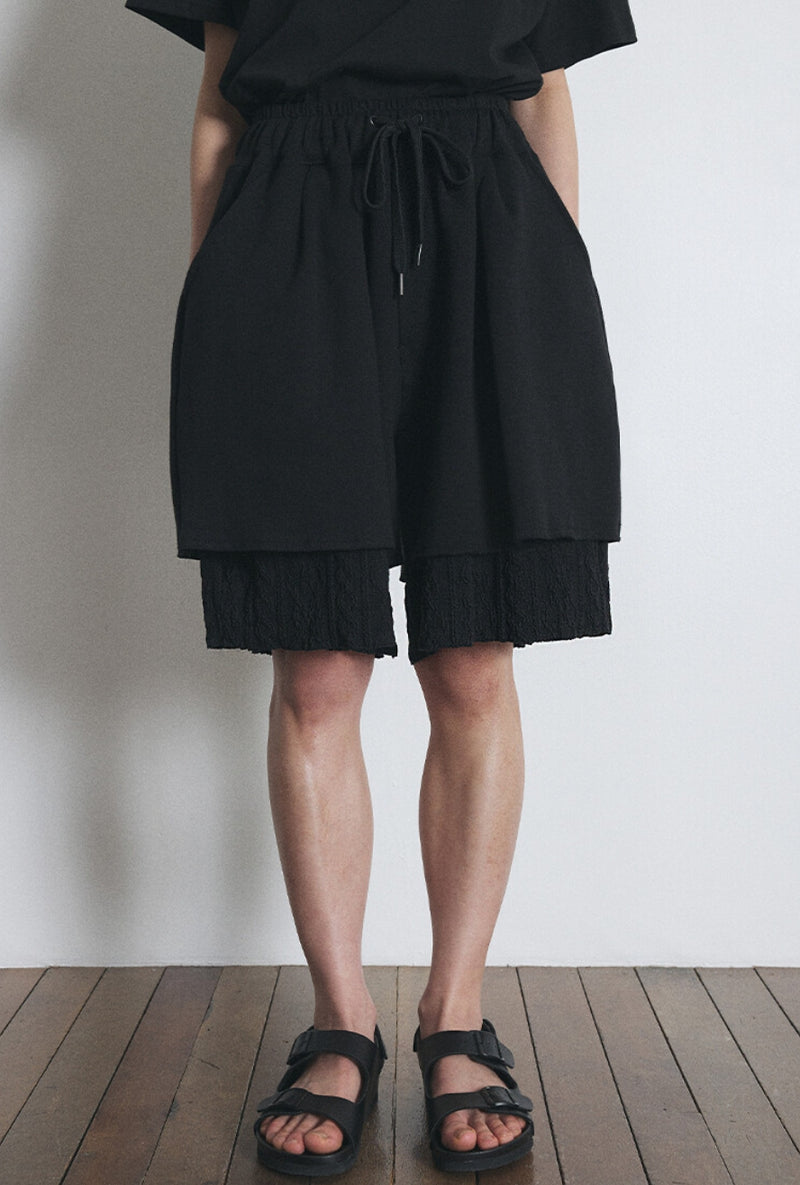 A NOTHING (エーナッシング) TWISTED ELASTIC LAYERED 1/2 PANTS (Black)