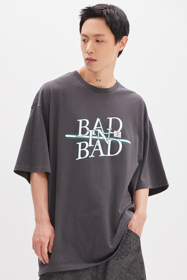 ベドインベド(BADINBAD) NEO LOGO TEE_CHARCOAL
