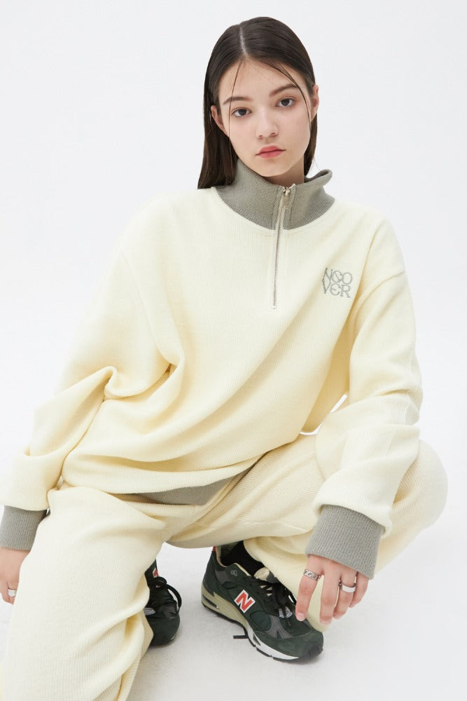 NCOVER（エンカバー）TYPO LOGO HALF ZIPUP KNIT-IVORY