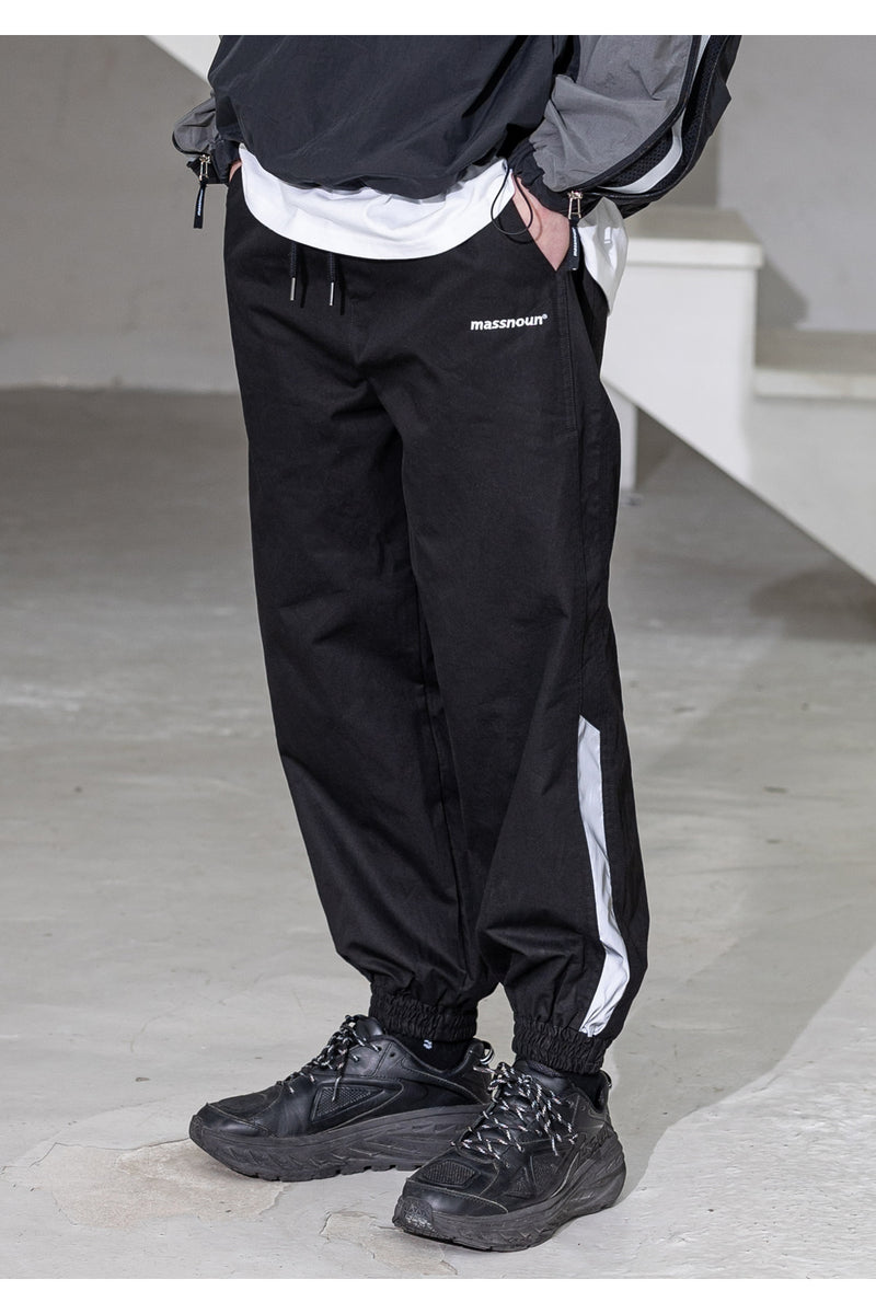 メスノウン(MASSNOUN) SL LOGO SECTION 3M LINE JOGGER PANTS MSZCP001-BK