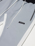 ディープリーク(DPRIQUE)  PANEL ZIPPER TRACK PANTS - LIGHT GREY/BLACK