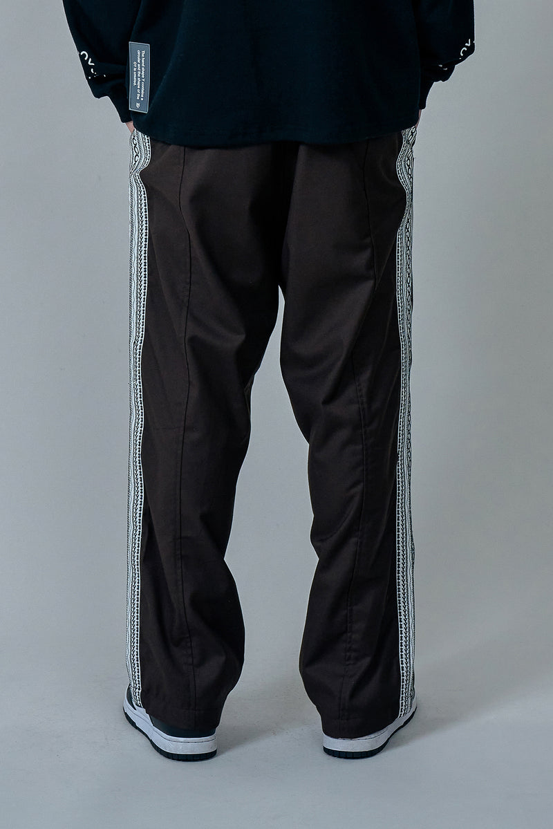オーワイ(OY) ETHNIC TAPE PANTS-BROWN